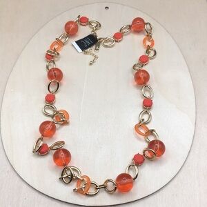 INC gold chain necklace with peach popsicle resin ball beads, long.